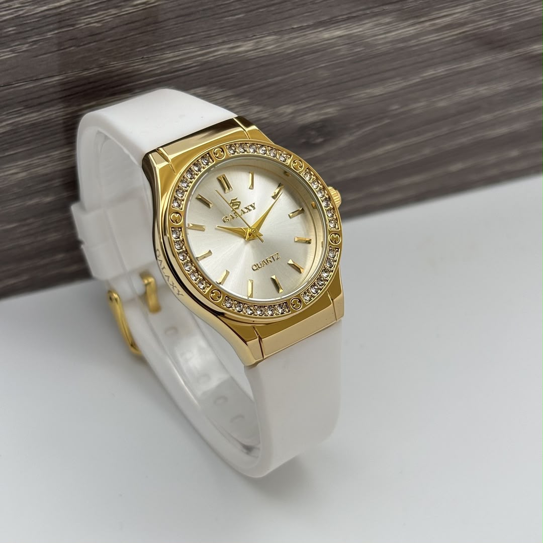 Montre Galaxy bracelet en silicone blanc, cadran doré serti de strass
